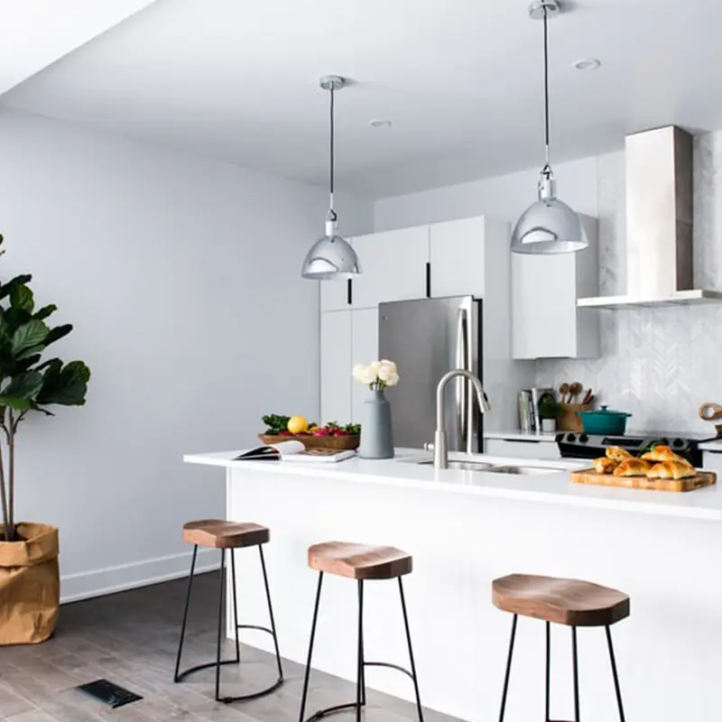 nice organized kitchen with a splash of green