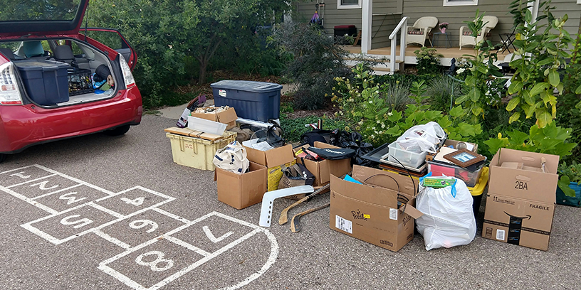 moving boxes outside of a house